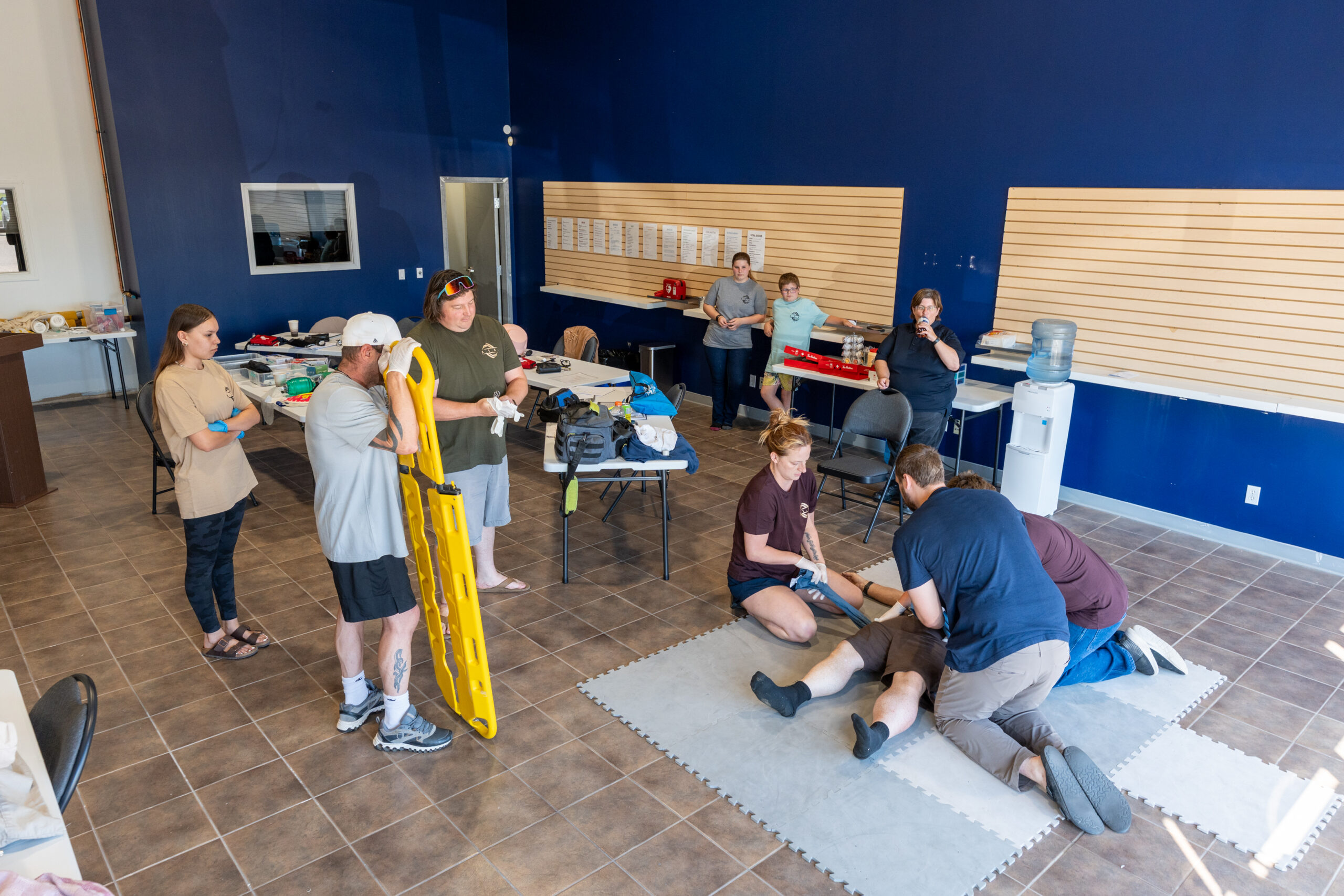 Group first aid training in classroom setting.